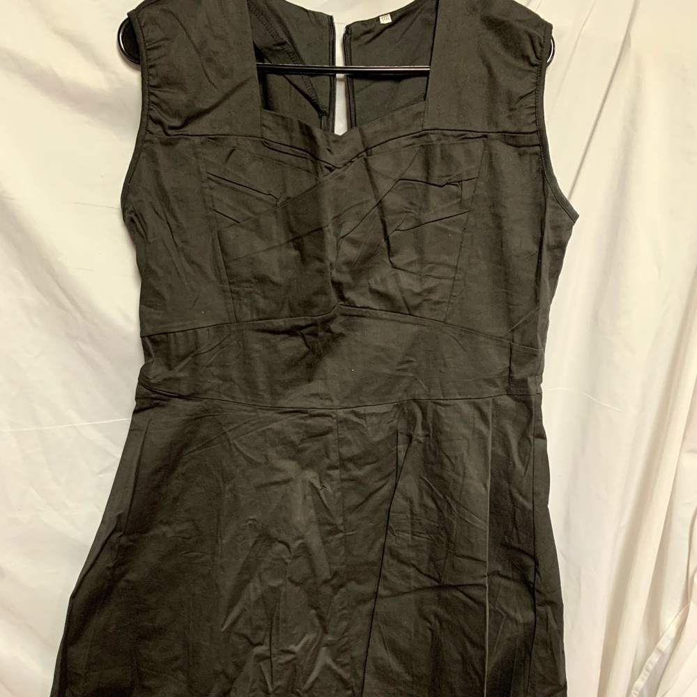 Black dress with toil on bottom.